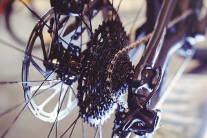 Closeup of a bicycle gears mechanism and chain on the rear wheel of mountain bike. Rear wheel cassette from a mountain bike. Close up detailed view.