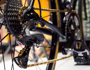 bicycle rear derailleur and gold chain